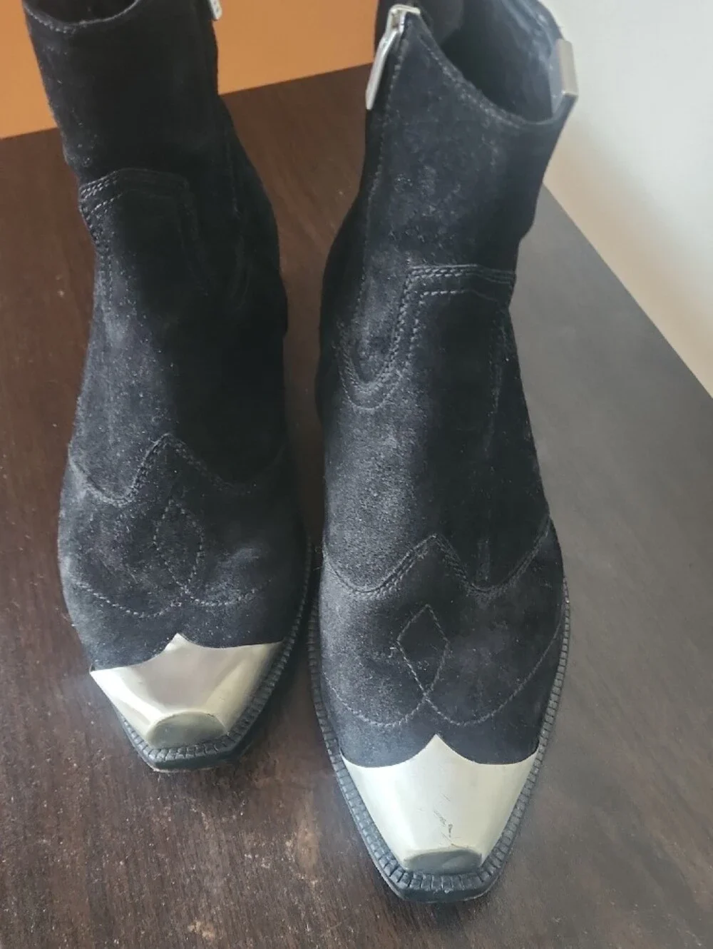 Represent black suede